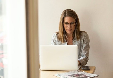 Woman on laptop.